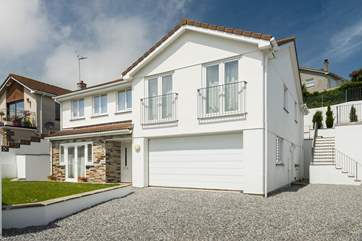 The Old Railings has partial reversed accommodation with the living areas, two bedrooms and two bath/shower-rooms upstairs and four bedrooms with two bath/shower-rooms downstairs.