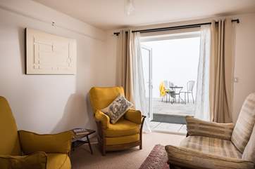 The large landing provides another sitting-area and leads out to the sun-trap terrace.