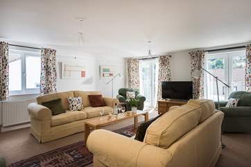 The big sitting-room has space for everyone to sit together and relax.