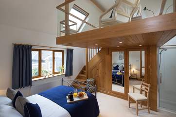 The master bedroom is superb, with its carefully crafted mezzanine, offering that somewhere quiet to escape to read a book or simply enjoy the view in peace.