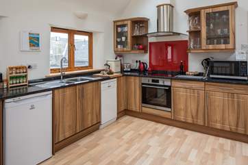 This brand new kitchen is a pleasure to create any meal in.