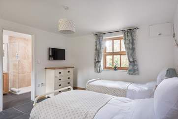 Light floods into the bedrooms with both having dual-aspect windows.