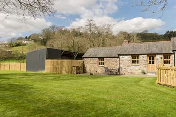 The Owners' land surrounds Kingfisher Cottage, 38 acres of beautifully kept paddock and woodland, managed to encourage wildlife.