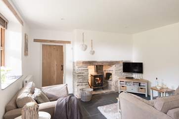 A warming wood-burner for toasting toes on chillier days.