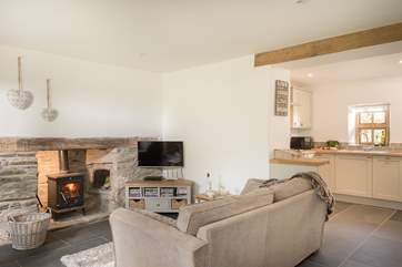 The open plan living-room is perfect for relaxing with friends and family.