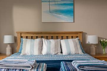 A comfortable 5' king-size bed.