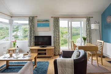 The open plan living-room is light and bright.