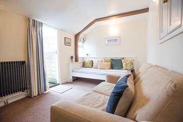 Walk through the first floor snug to access the first floor roof terrace.