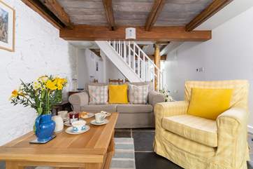 Relax in the pretty living/dining room.