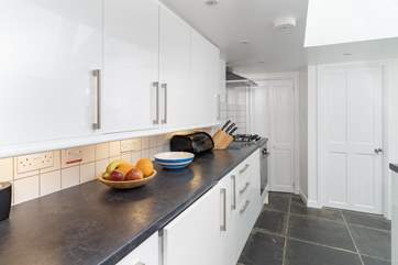 The ground floor bathroom is accessed through the kichen.