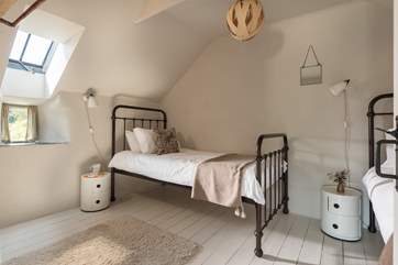 The comfortable twin bedroom, set at the opposite end of the cottage to the double bedroom.