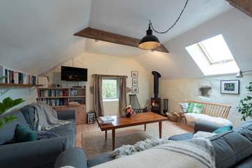 Relax in front of the roaring wood-burner.