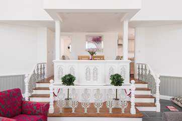 Lots of beautiful original features like these lovely filigree railings.