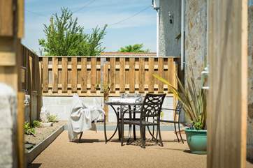Sheltered and screened for privacy, the courtyard is a real sun-trap.