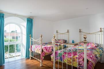 Bedroom 2 has lovely Victorian-style single beds.