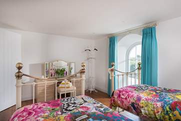 Vibrant colours in Bedroom 2, perfect for children.