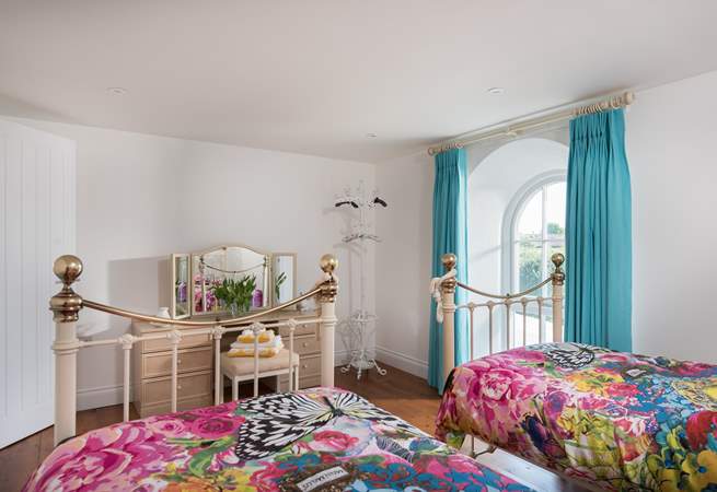Vibrant colours in Bedroom 2, perfect for children.
