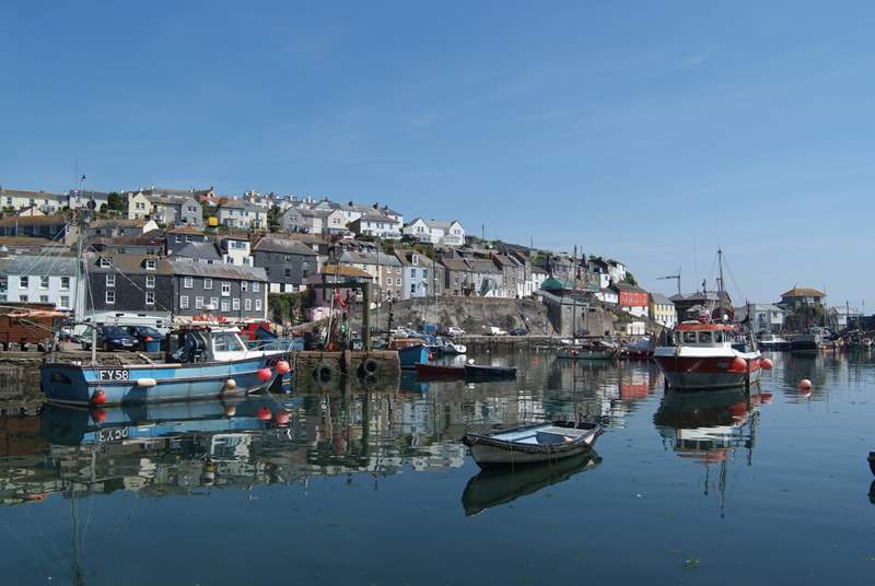 Picturesque Mevagissey harbour is less than five miles away.