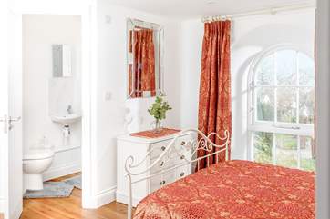 Bedroom 1 has a double bed and en suite shower room.