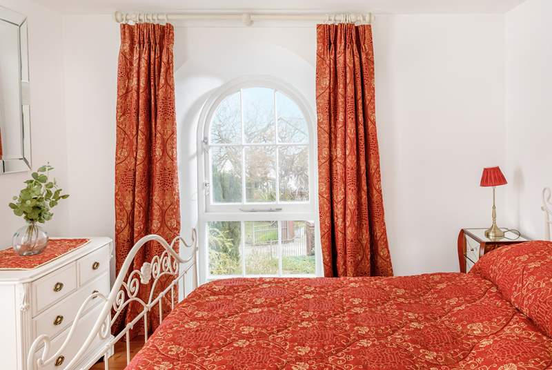 Beautiful features include the arched windows.