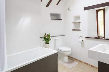 Sparkling family bathroom.