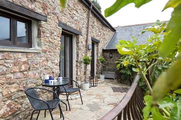 What a welcoming sight. A lovely little sun-trap right on your front doorstep, especially when we have a sunny day.