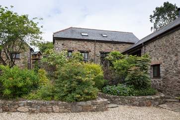 Laurel Cottage through the beautiful greenery.