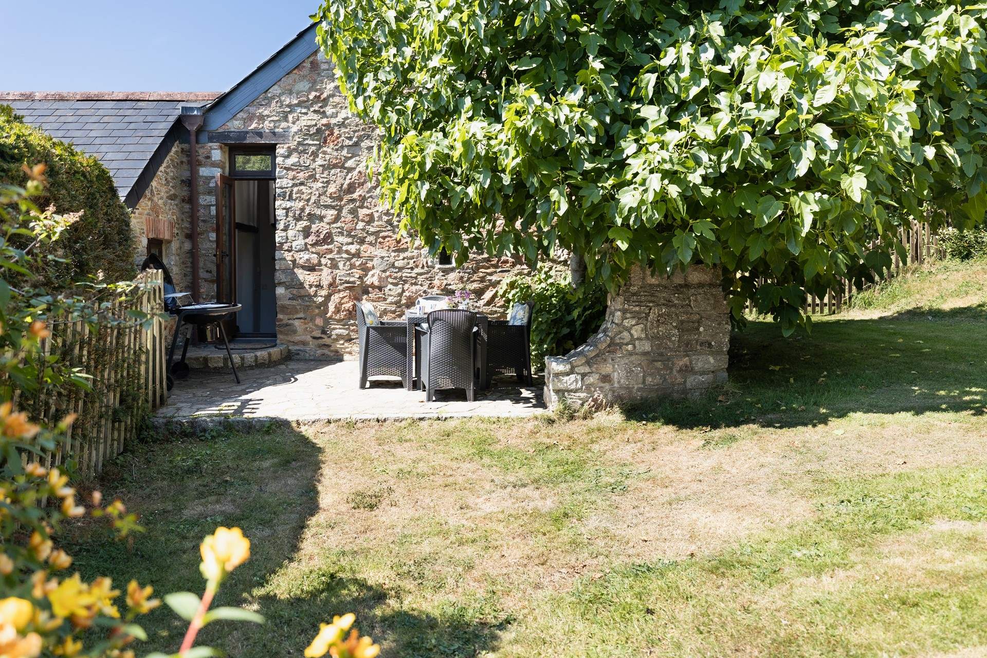 Many days/nights can be enjoyed sitting in this little sun-trap. Especially as you have the peace of mind that younger members of your group, or your four-legged friend, can't escape.