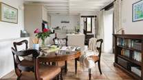 The dining area is perfect for planning the day ahead or coming together after a busy day exploring.