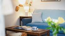 Sit back and relax in the cosy living area after a long day exploring the beautiful surroundings of the South Hams.