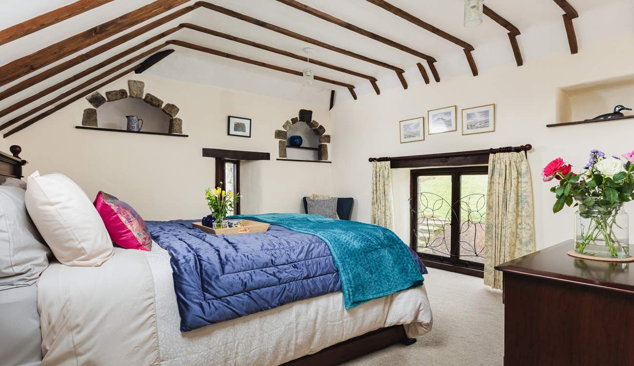 Bedroom One has some lovely features and a king-size bed.