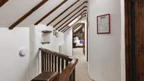 There are exposed beams throughout.
