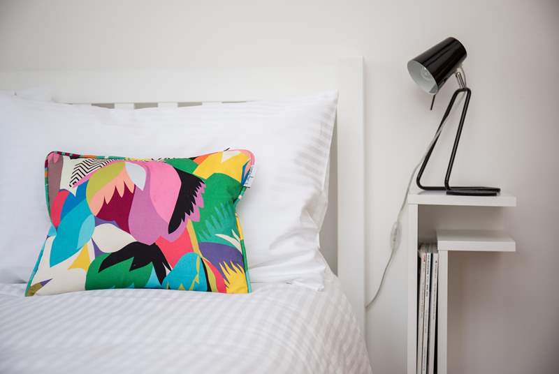 Vibrant colours flow through the second bedroom.