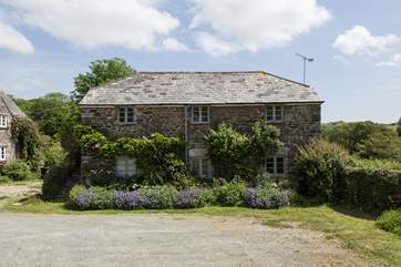 Looking at Oak Cottage as you enter the courtyard and make your way to your allocated parking spot to the right of the property.
