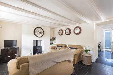 Another view of the sitting-room leading off to the kitchen.