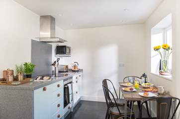 The small but light-filled Shaker-style kitchen.