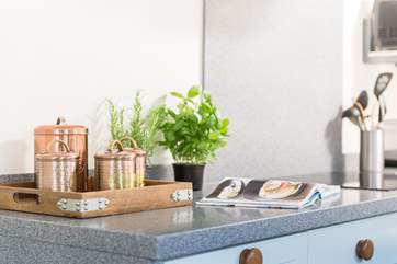An eye for detail with the copper containers on the tea tray.