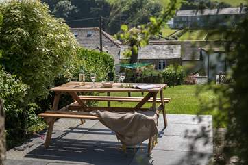 Enjoy a glass of wine in the garden at the end of the day.