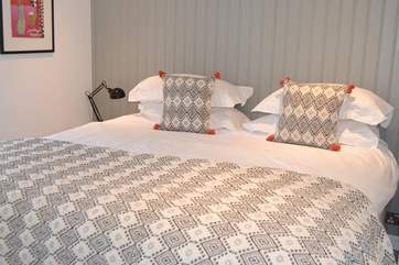 An extremely comfortable six-foot bed which can also be made into twin beds.