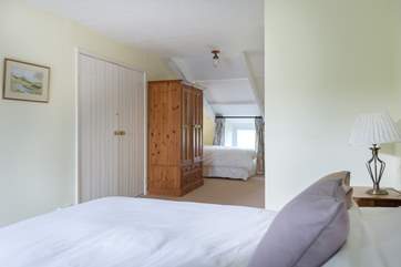 Bedroom 1 is spacious and the single bed is hidden away on the opposite side of the room.