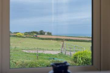 The sea views can also be enjoyed from the small window in the bathroom.