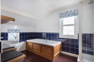 The spacious bathroom with shower cubicle and bath, there is also a separate WC on the ground floor. (Please note that due to the locality the water pressure can be sensitive).