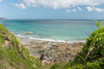 The waters are perfect for swimming, the beach has a lifeguard in the main season as well as a beach hut and beach cafe selliing drinks, snacks and ice creams.