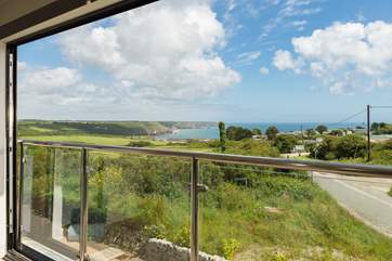 This is the view from the Juliet balcony in the sitting-room, the wall of glass folds back so the fabulous views are unobstructed.