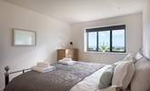 The main bedroom also shares those wonderful sea views and has an en suite shower-room. - Thumbnail Image