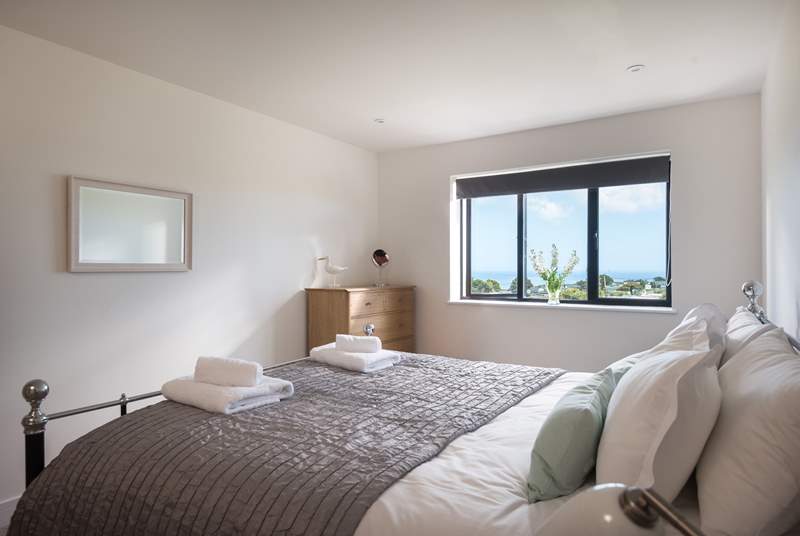 The main bedroom also shares those wonderful sea views and has an en suite shower-room.