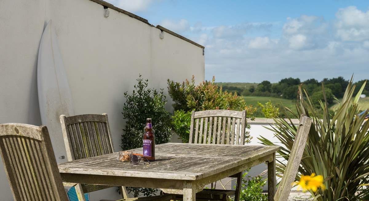 In the shared courtyard there is a table and chairs, bench seat and washing line for guests' use.