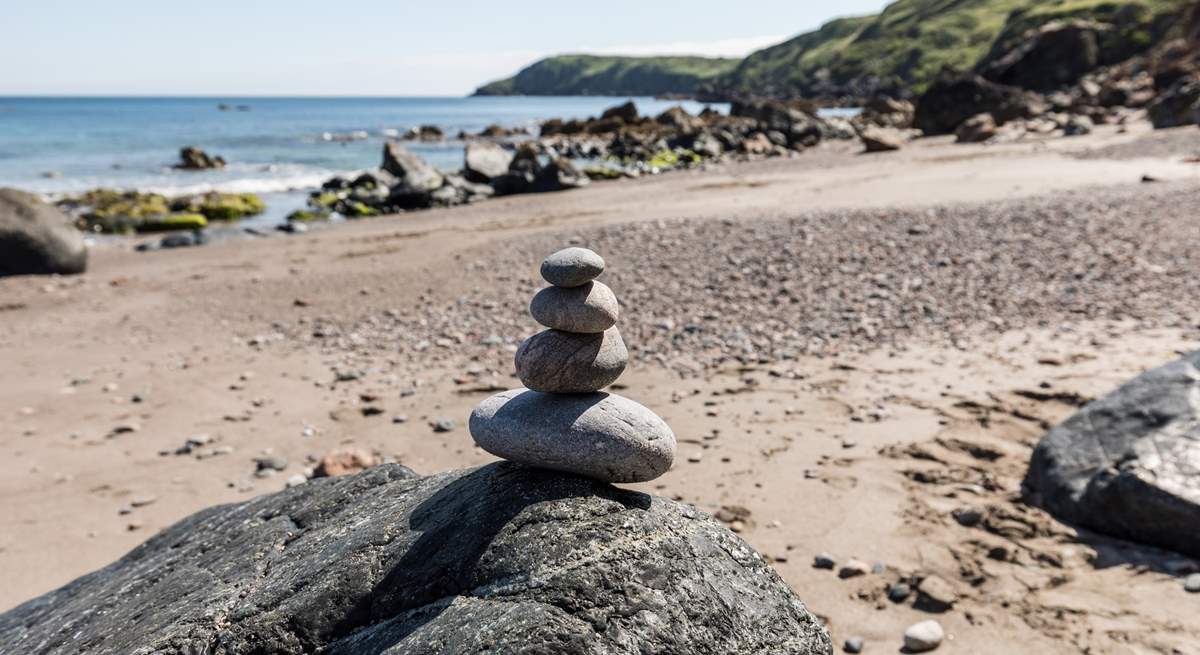 Kennack Sands has a dog-friendly area of beach next to the main beach,  just follow the signs when you get down there.