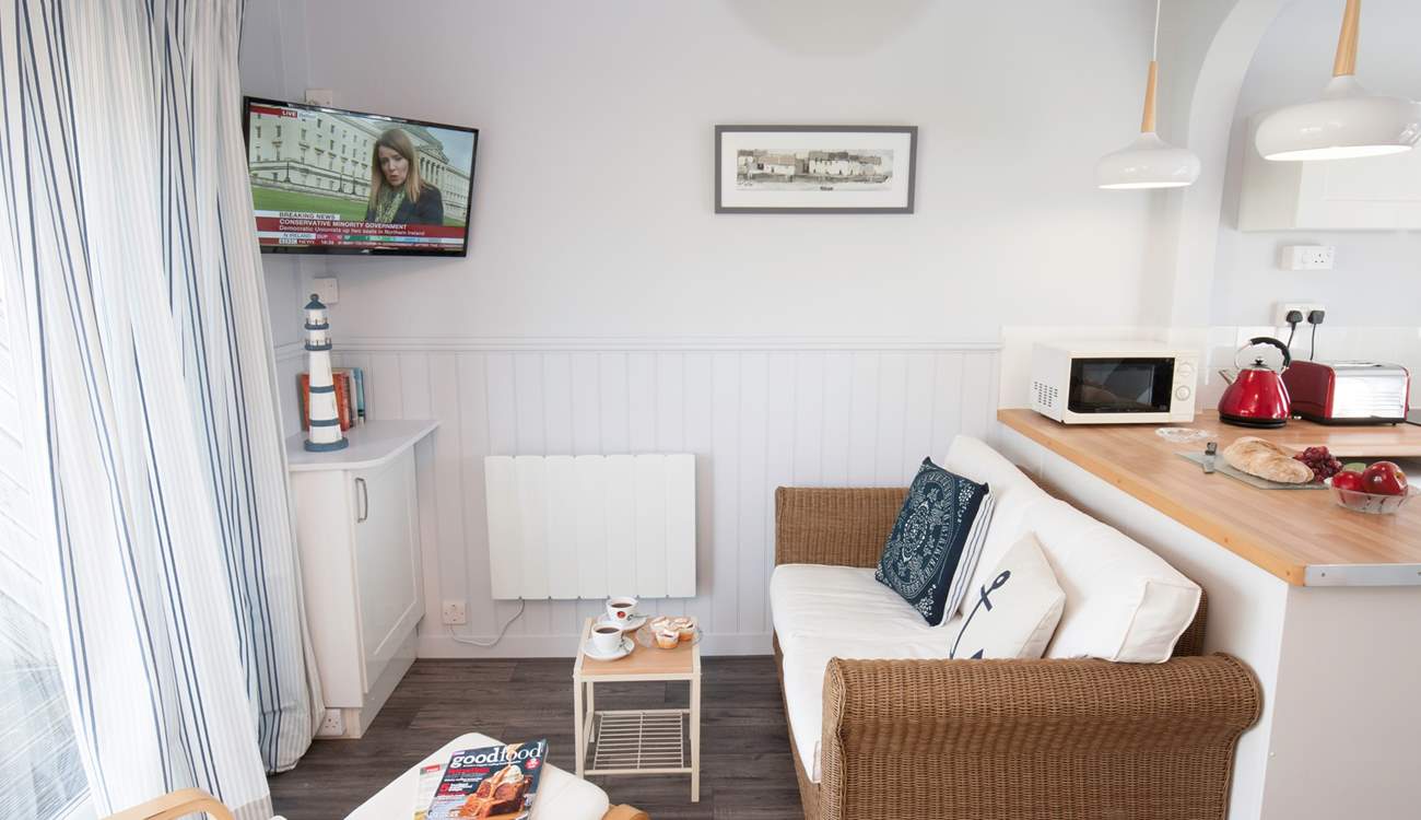 On a warm summer day, open up the patio doors in the sitting-room and relax.