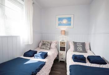 The delightful twin bedroom has views of the Hersey Nature Reserve, perfect for children.